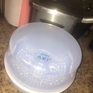 Baby's bottle warmer and sanitizer